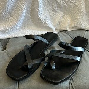 Woman’s black sandal